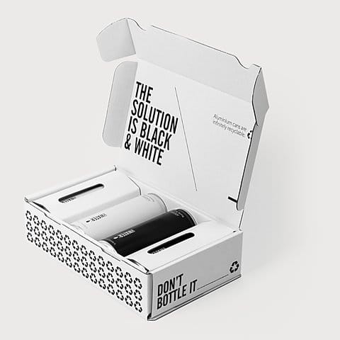 Rozwiązanie jest czarne i białe, dwie puszki wody CanO gazowanej i niegazowanej.